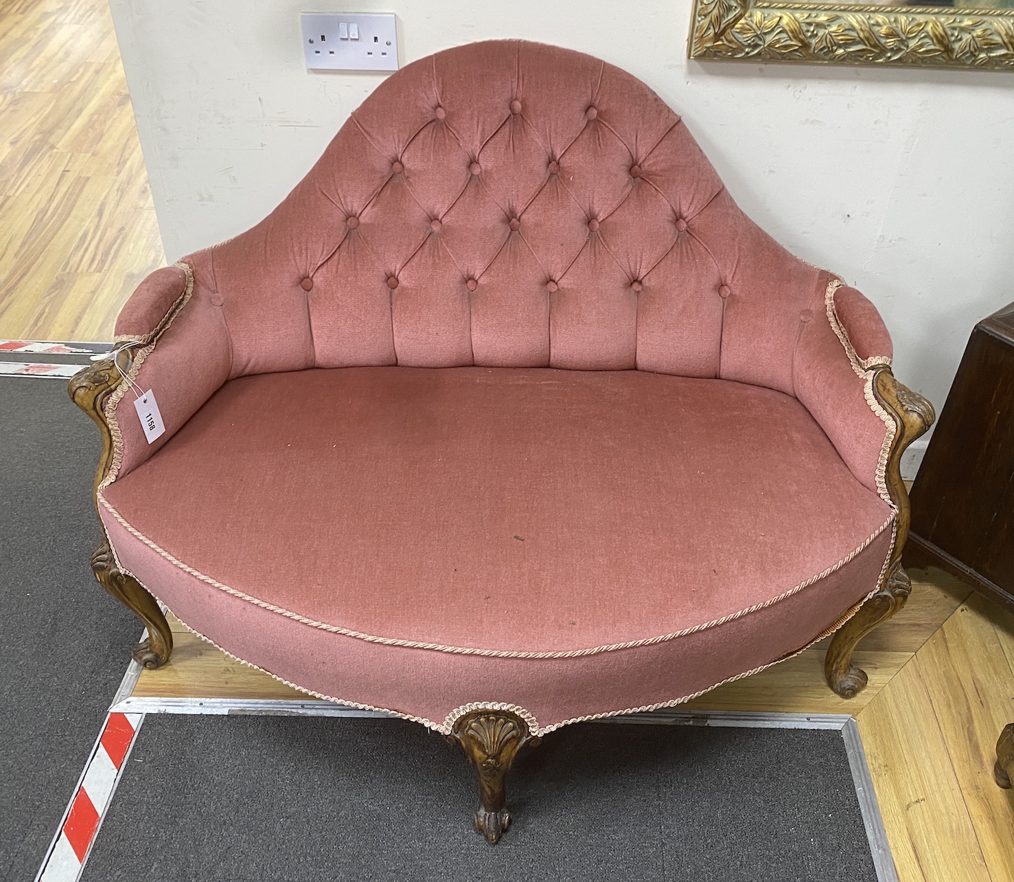 A Victorian carved walnut settee, length 116cm, depth 80cm, height 88cm